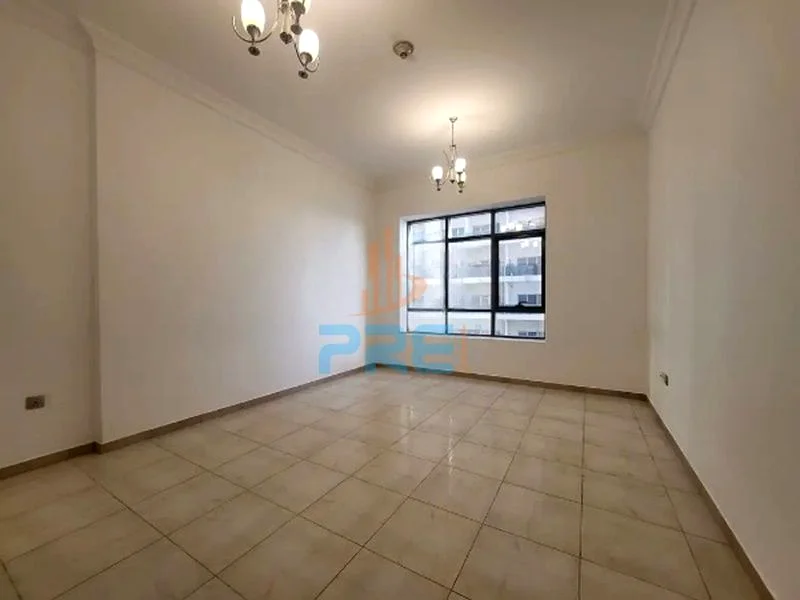 شقة غير مفروشة من غرفة نوم واحدة مع شرفة I شاغرة I 1-4 شيكات63612103270657112
