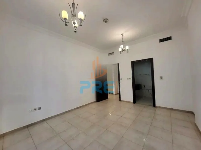 شقة غير مفروشة من غرفة نوم واحدة مع شرفة I شاغرة I 1-4 شيكات63612103270657113