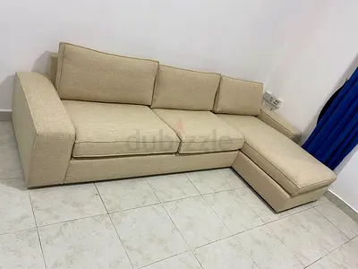 Kivik L shape four seater sofa beige color