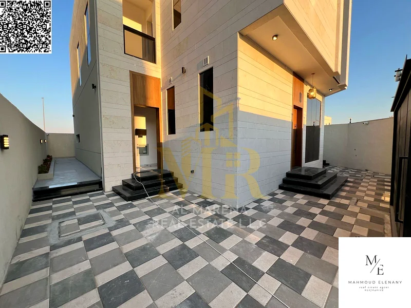 For Sale – Luxury Corner Villa in Al Helio 2 – Ajman | 5 Master Bedrooms + Majlis & 2 Halls + Modern Kitchen + Full Central AC | Main Road & Close to63898440155779113