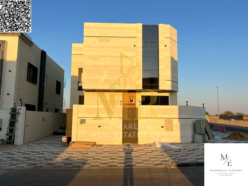 For Sale – Luxury Corner Villa in Al Helio 2 – Ajman | 5 Master Bedrooms + Majlis & 2 Halls + Modern Kitchen + Full Central AC | Main Road & Close to63898440155779111