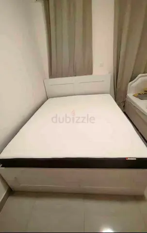 IKEA brimness queen size bed with 4 storage drawers underneath and with  IKEA mattress