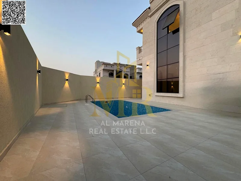 A villa with a price including registration and ownership fees on the main street, ready for occupancy in the most upscale areas of Ajman, freehold fo63897311322497114