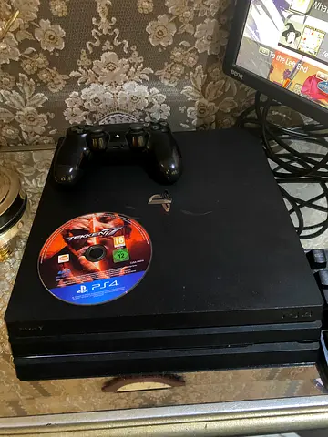 Sony PlayStation 4 pro 1 TB Console with Controller and tekkin 7 cd for Sale