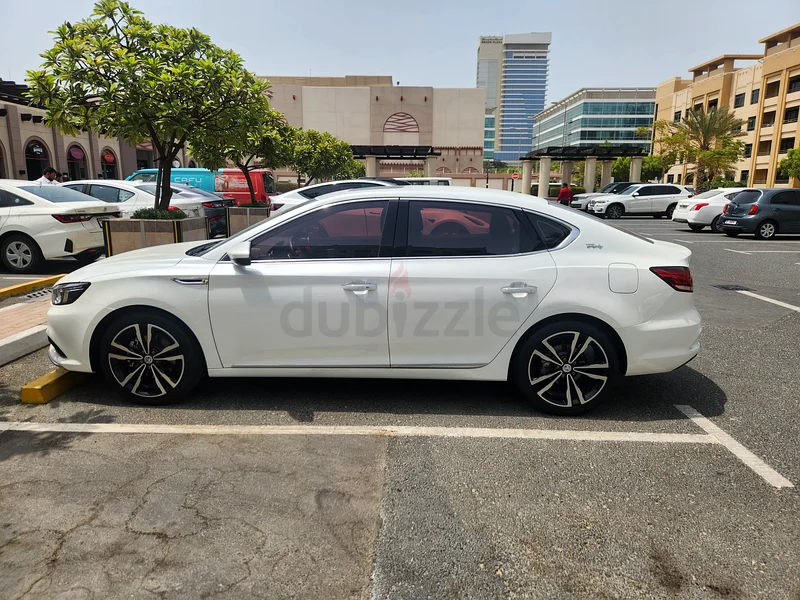 2023 MG 6 Trophy – Pearl White, Black  Red Leather, Like New | 14,300 km | 75,000 AED63490884381955113