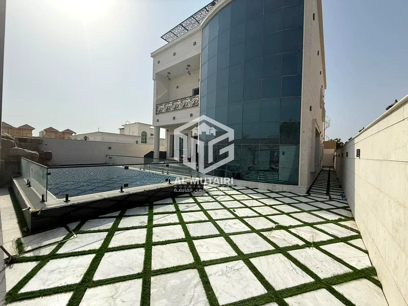 فيلا فاخرة للبيع – أول ساكن – 6 غرف نوم رئيسية – مع مسبح وسقف مفروش – عجمان63877988613378111