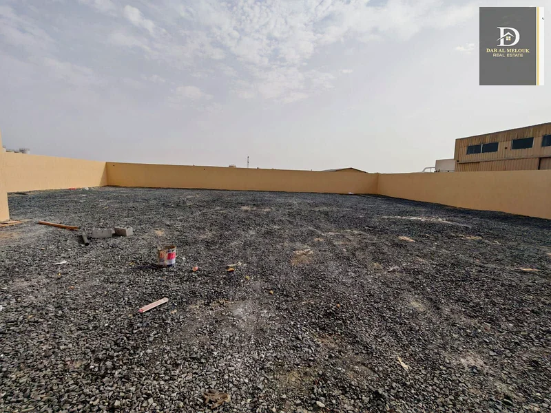For rent in Al Sajaa Industrial Area, a fenced plot of land63622481639553111