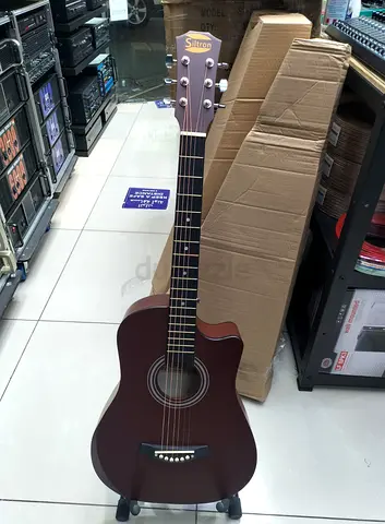 Strum Your Dreams with this Stunning Siltron Acoustic Guitar