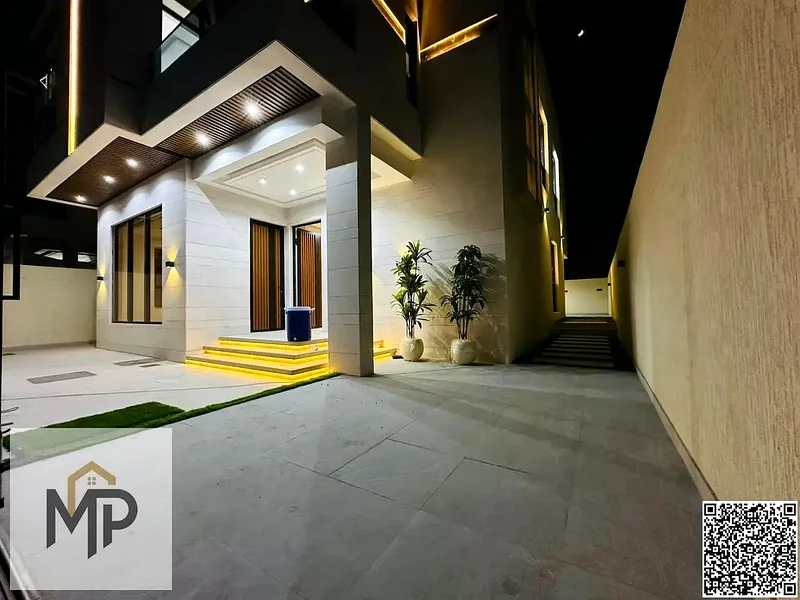 For sale, a modern villa, including registration fees, close to the mosque and services, with a seating area in the courtyard, with no down payment.63897311364994113