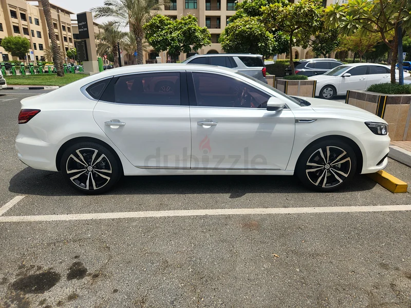 2023 MG 6 Trophy – Pearl White, Black  Red Leather, Like New | 14,300 km | 75,000 AED63490884381955112