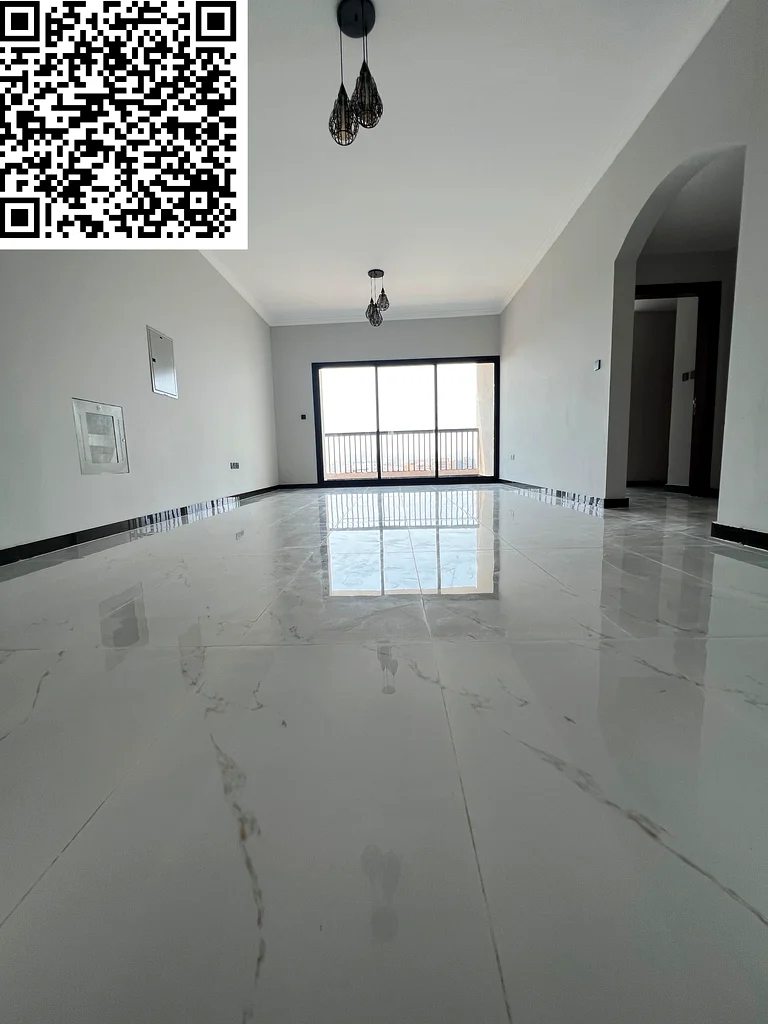 Two bedrooms and a spacious hall, first tenant in Al Muwaihat 3 - Ajman, 3 bathrooms, built-in wardrobes, central air conditioning, prime location nea63711781313794114