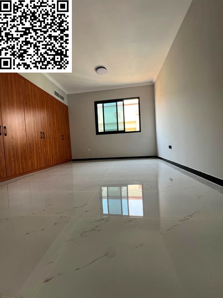 Two bedrooms and a spacious hall, first tenant in Al Muwaihat 3 - Ajman, 3 bathrooms, built-in wardrobes, central air conditioning, prime location nea63711781313794111