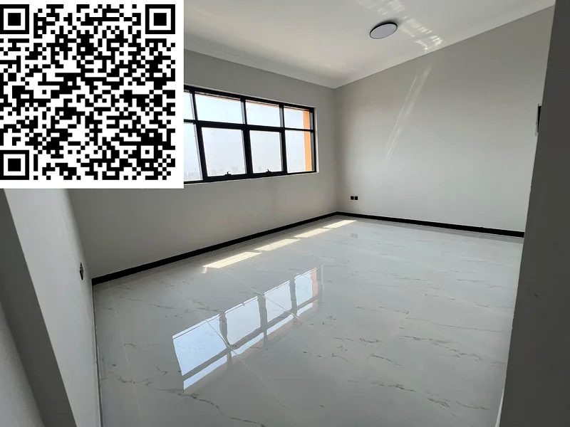 Two bedrooms and a spacious hall, first tenant in Al Muwaihat 3 - Ajman, 3 bathrooms, built-in wardrobes, central air conditioning, prime location nea63711781313794112