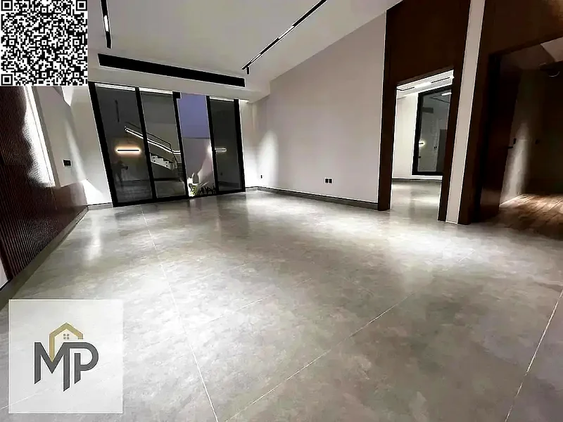 Villa for sale - two floors and a large courtyard - close to Sheikh Mohammed bin Zayed Road - freehold for all nationalities for life -63880932657411114
