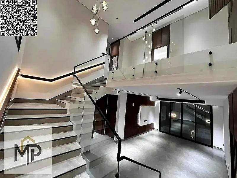 Villa for sale - two floors and a large courtyard - close to Sheikh Mohammed bin Zayed Road - freehold for all nationalities for life -63880932657411113