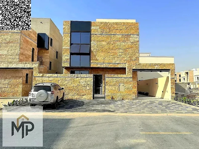 Villa for sale - two floors and a large courtyard - close to Sheikh Mohammed bin Zayed Road - freehold for all nationalities for life -63880932657411111