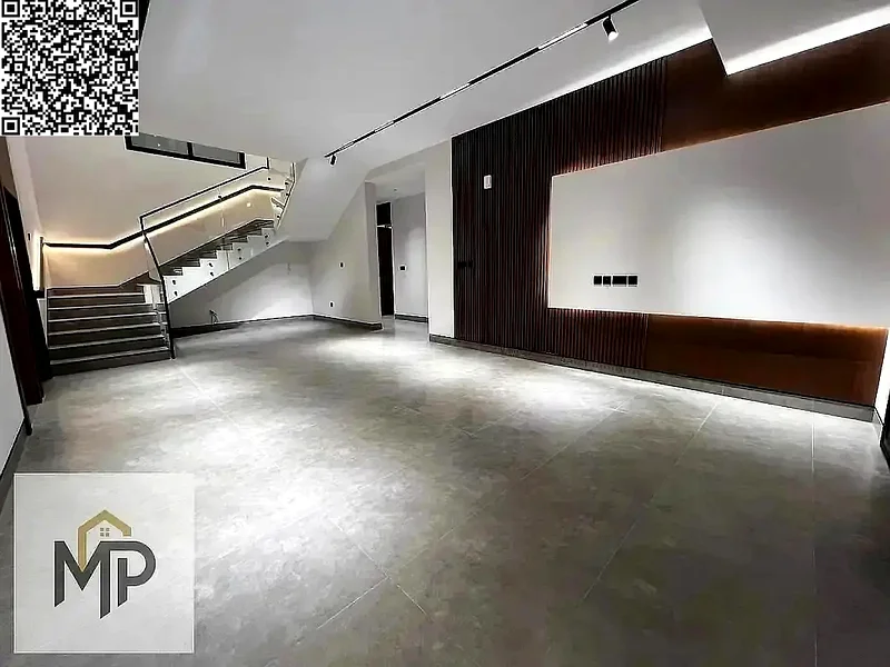 Villa for sale - two floors and a large courtyard - close to Sheikh Mohammed bin Zayed Road - freehold for all nationalities for life -63880932657411112