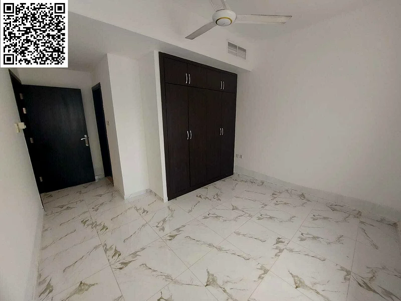 Spacious 2BR Hall + 2 Baths, master room with built-in wardrobes, second tenant, modern & elegant finishes, prime location close to all essential serv63721248049154113