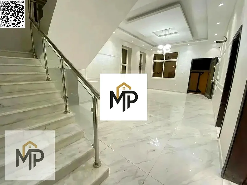 For sale, a villa, including registration and ownership fees, directly opposite the mosque, two floors, stone facade, with the possibility of easy ban63897311389186113