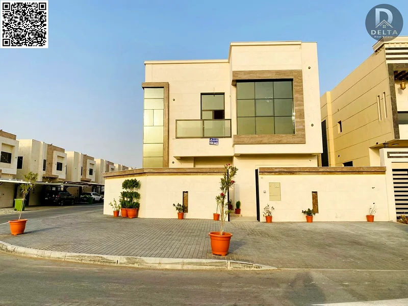 🏡 Luxurious corner villa for sale in Al Helio 2 - Ajman 📍 Ideal location | Elegant design | Electricity and water included  ✨ A golden opportunity t63898098003331111