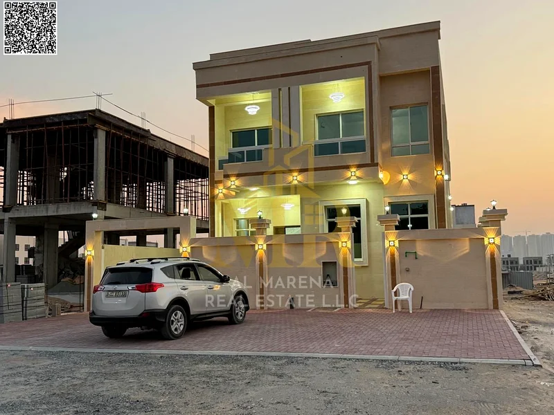 A villa with an all-inclusive price, electricity and water, on the main street, ready for occupancy in the most upscale areas of Ajman. Freehold for a63898098144257111