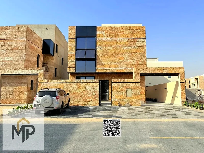 Villa for sale - two floors and a large courtyard - close to Sheikh Mohammed bin Zayed Road - freehold for all nationalities for life -63881704994690110