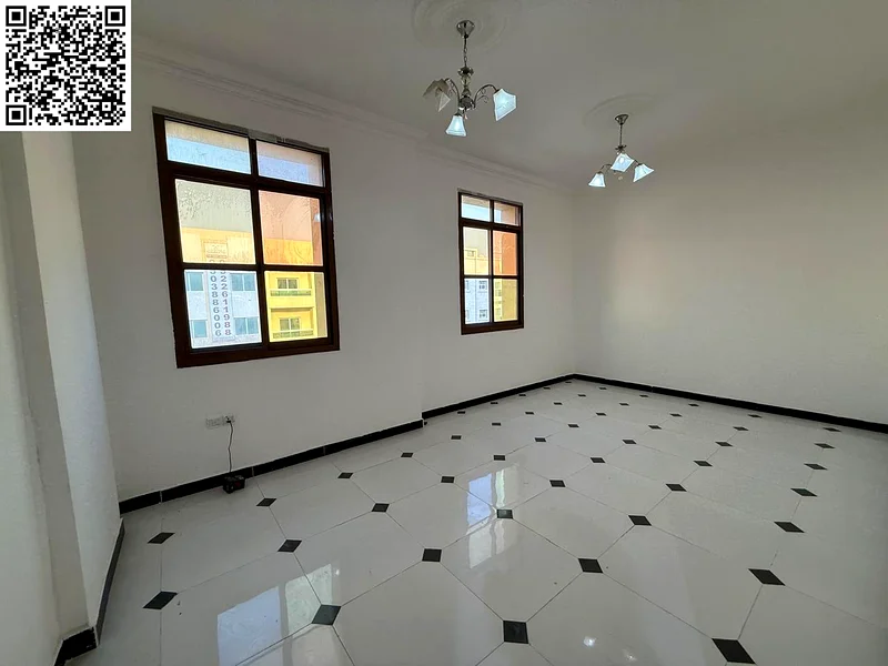 The most luxurious two-bedroom apartment in Al Rawda 3, Ajman - balcony with an open view - super deluxe finishing - spacious areas - upscale building63718660408195112