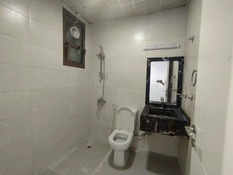 For annual rent, luxury 2BHK in Al Rawda 2 Ajman. 2 baths, spacious hall with balcony, wide fitted kitchen, prime family-friendly location.63718756727810113