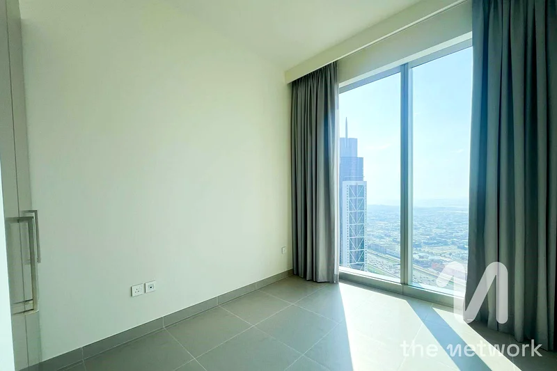 High-Floor 2BR | Burj Views | Prime Location63771815000321114