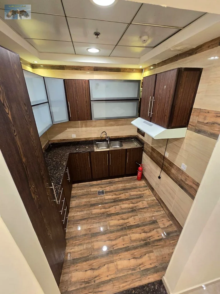 “1BR + hall for annual rent in Al Rawda 3, Ajman | Parking included, flexible payment | Prime location near ADCB, easy exit to Dubai/Sharjah.”63719604445827112