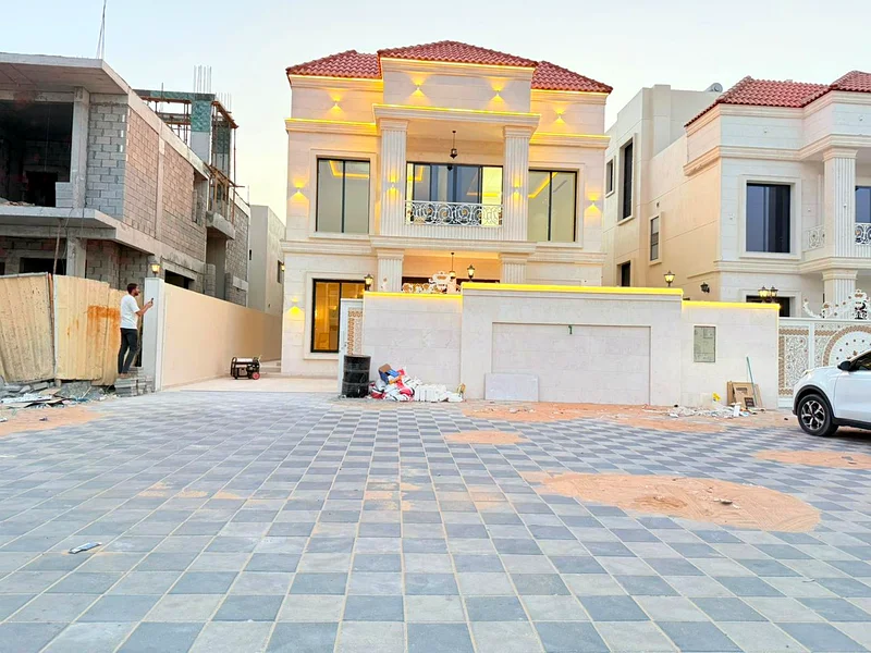Own one of the most luxurious villas in Ajman, with a palace design, super deluxe finishes, and personal construction, including registration and owne63897760669314110