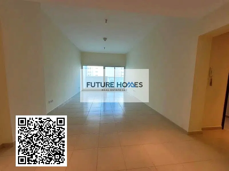 شقة مطبخ مغلق 2 غرفة نوم للبيع في برج عجمان وان مع موقف سيارات63888159714690112