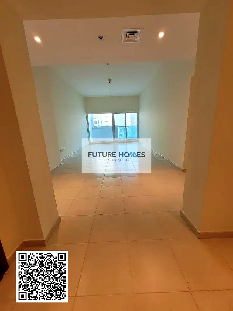شقة مطبخ مغلق 2 غرفة نوم للبيع في برج عجمان وان مع موقف سيارات63888159714690111
