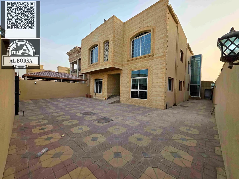 For sale: Villa - Two floors, roof, and large courtyard with an internal elevator - Close to Sheikh Mohammed bin Zayed Road - Freehold for all nationa63874581467010111