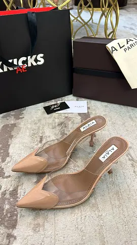 ALAÏA LE COEUR MULES IN PATENT CALFSKIN ‘BEIGE’