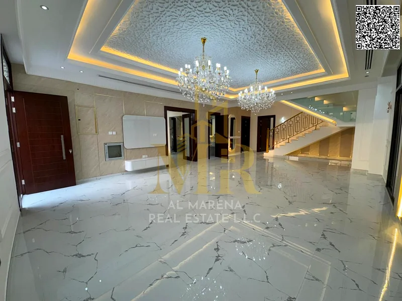 🏡 فيلا فاخرة للبيع في الهيليو 2 - مقابل مجمع أزها - المساحة 4300 قدم - طابقين - 5 غرف نوم رئيسية بسعر 2,400,000 درهم، قابل للتفاوض63898671326338114