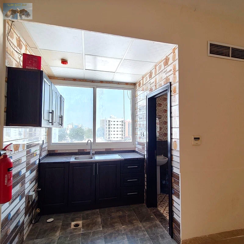 Large studio for annual rent in Al Rashidiya 2 in Ajman, spacious area, excellent finishing, close to all services, distinguished location63721248218115114