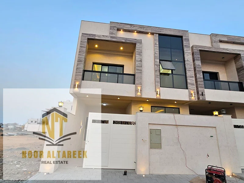 Would you like to own a townhouse in Al Helio 2, Ajman, with a distinguished area and location, consisting of 5 master bedrooms, a kitchen, a preparat63899002505089111