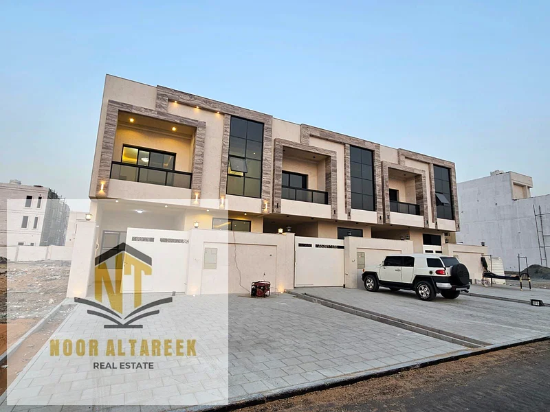 Would you like to own a townhouse in Al Helio 2, Ajman, with a distinguished area and location, consisting of 5 master bedrooms, a kitchen, a preparat63899002505089110