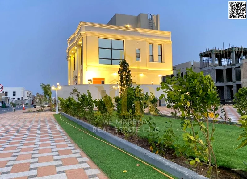 Luxury super deluxe villa for sale in Al Bahia area in Ajman, freehold for all nationalities, at a price including registration and ownership fees63885559350019110