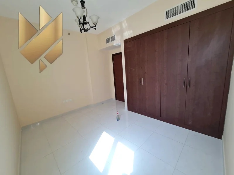 Spacious 2-Bedroom Apartment + Built-in Wardrobes + Parking – Perfect Home in Muwailih New Area63612103300227112