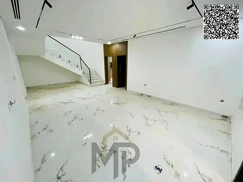 For sale, a corner villa in Al Helio 2 - Ajman, directly from the owner, in a prime location and excellent space. Registration fees included.63913993994754113