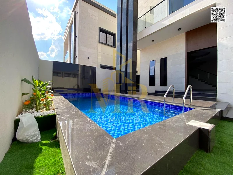 For sale - a luxurious villa with a swimming pool in a prime location in Ajman, high-end finishing, modern design, including registration and ownershi63914525027843110