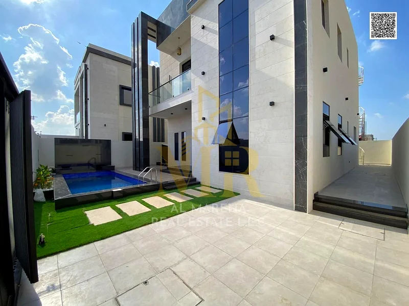 For sale - a luxurious villa with a swimming pool in a prime location in Ajman, high-end finishing, modern design, including registration and ownershi63914525027843113