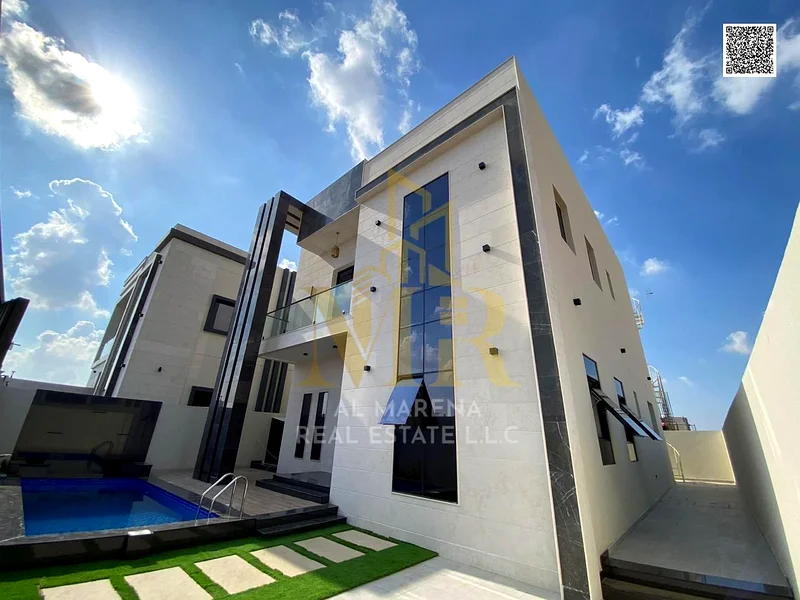 For sale - a luxurious villa with a swimming pool in a prime location in Ajman, high-end finishing, modern design, including registration and ownershi63914525027843112