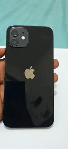 Apple iPhone 12 Midnight - Slight body paint scratches and a small dent only