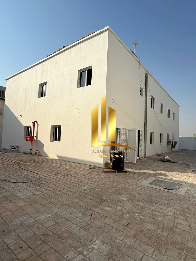 Warehouse for sale in Al Hanou Al Jalil, Al Sajaa Industrial Area. (Warehouse + Workers' Housing + Retail Shops). Land area: 21,265 sq ft. Property Sp63818717680386114