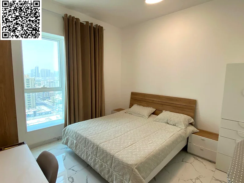 With a down payment of 220,000 - For sale - a luxurious apartment in Al Waha Towers, Ajman | 2 bedrooms and a hall, 3 bathrooms, a fully equipped kitc63890128850691111