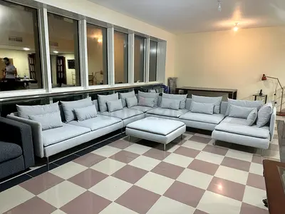 IKEA Söderhamn U-shaped sofa with footstool light gray