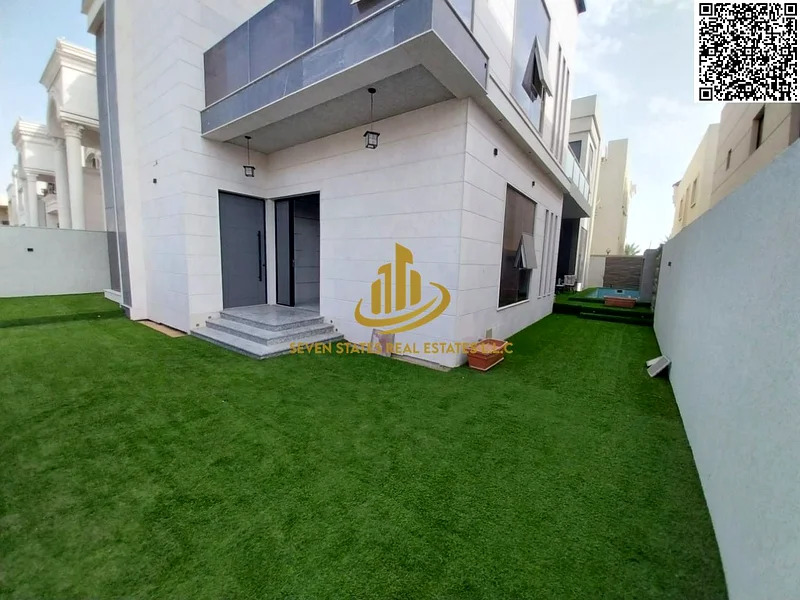 "Own a luxury villa in Al Alia, Ajman – modern design, private pool & waterfall, prime location near all services with a negotiable price"63871768623490111
